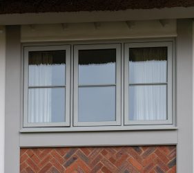 Painswick Wood Effect Windows for Traditional Tudor Style Home