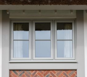 Painswick Wood Effect Windows with Middle Astragal Bar Design