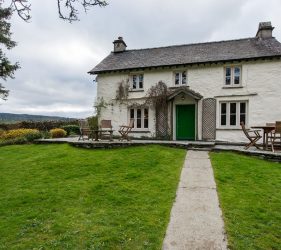 Cream and White Wood Effect PVCu Windows for Cottage Renovation in Cumbria