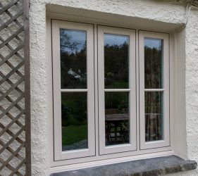 Cream and White Wood Effect PVCu Windows for Cottage Renovation in Cumbria