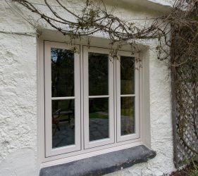 Timber Effect PVCu Windows with Wood Style Cream Finish and Cottage Bar