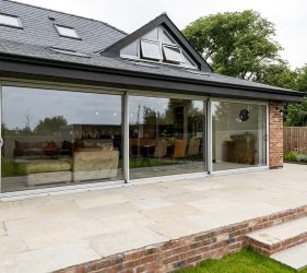 Smart Sliding Aluminium Glazed Patio Doors in Painswick RAL 7038